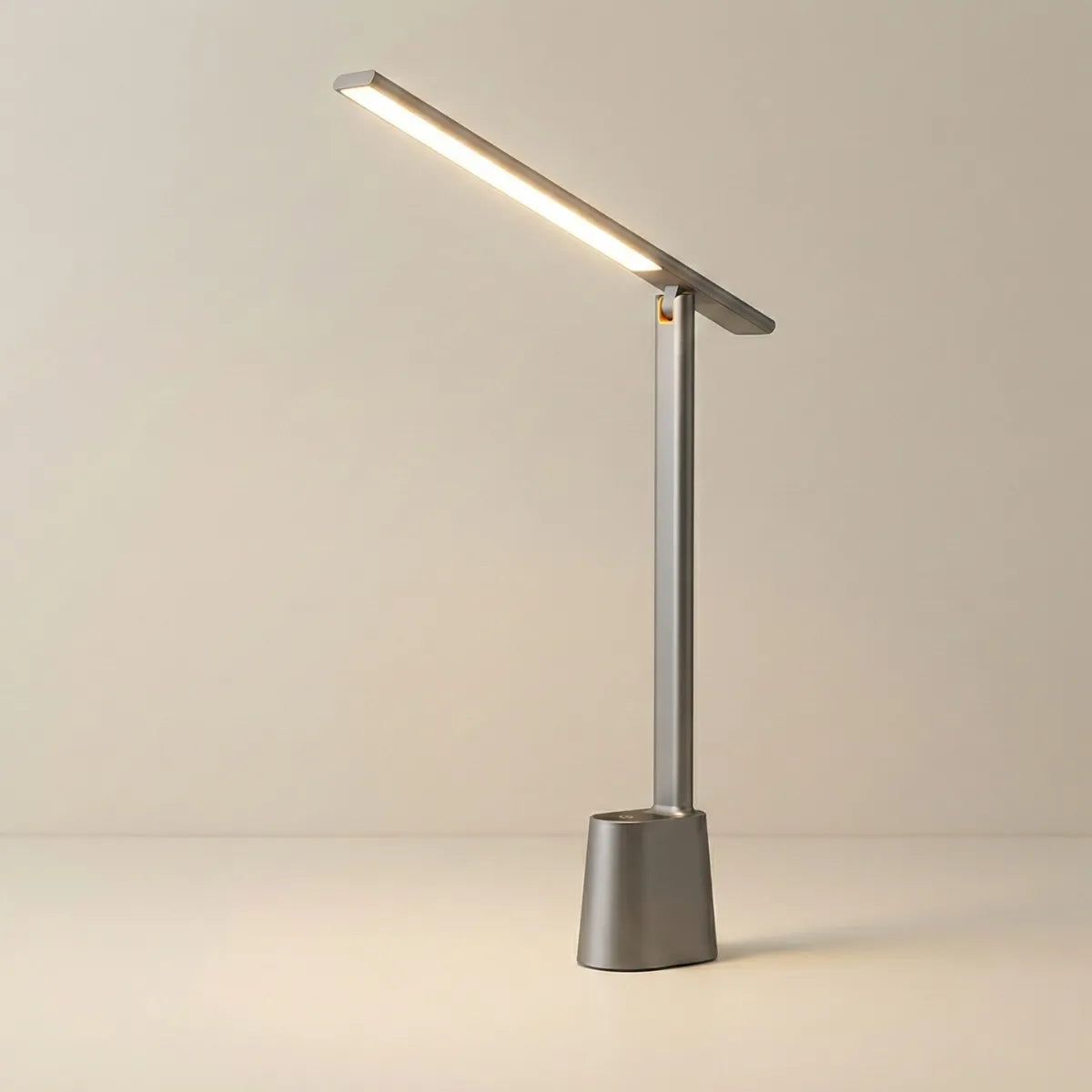 Luminária de mesa minimalista Baseus na cor cinza com design moderno e iluminação LED ajustável isolada em fundo neutro.