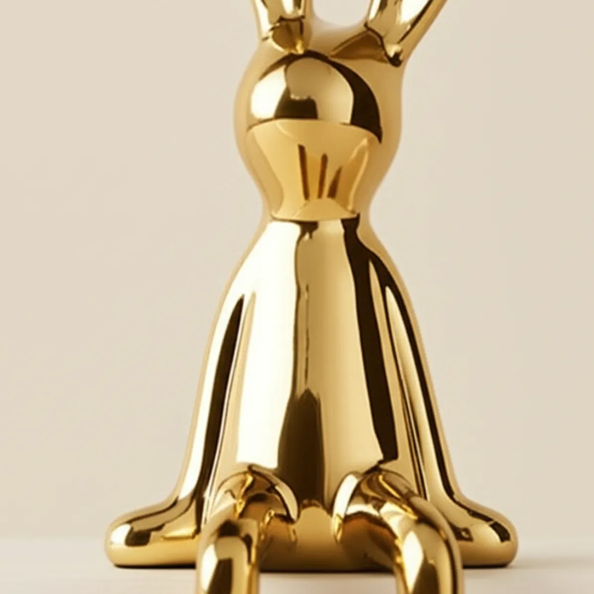 escultura-decorativa-coelho-dourado-modernize-foto-zoom-frontal-escultura-de-coelho-em-fundo-bege