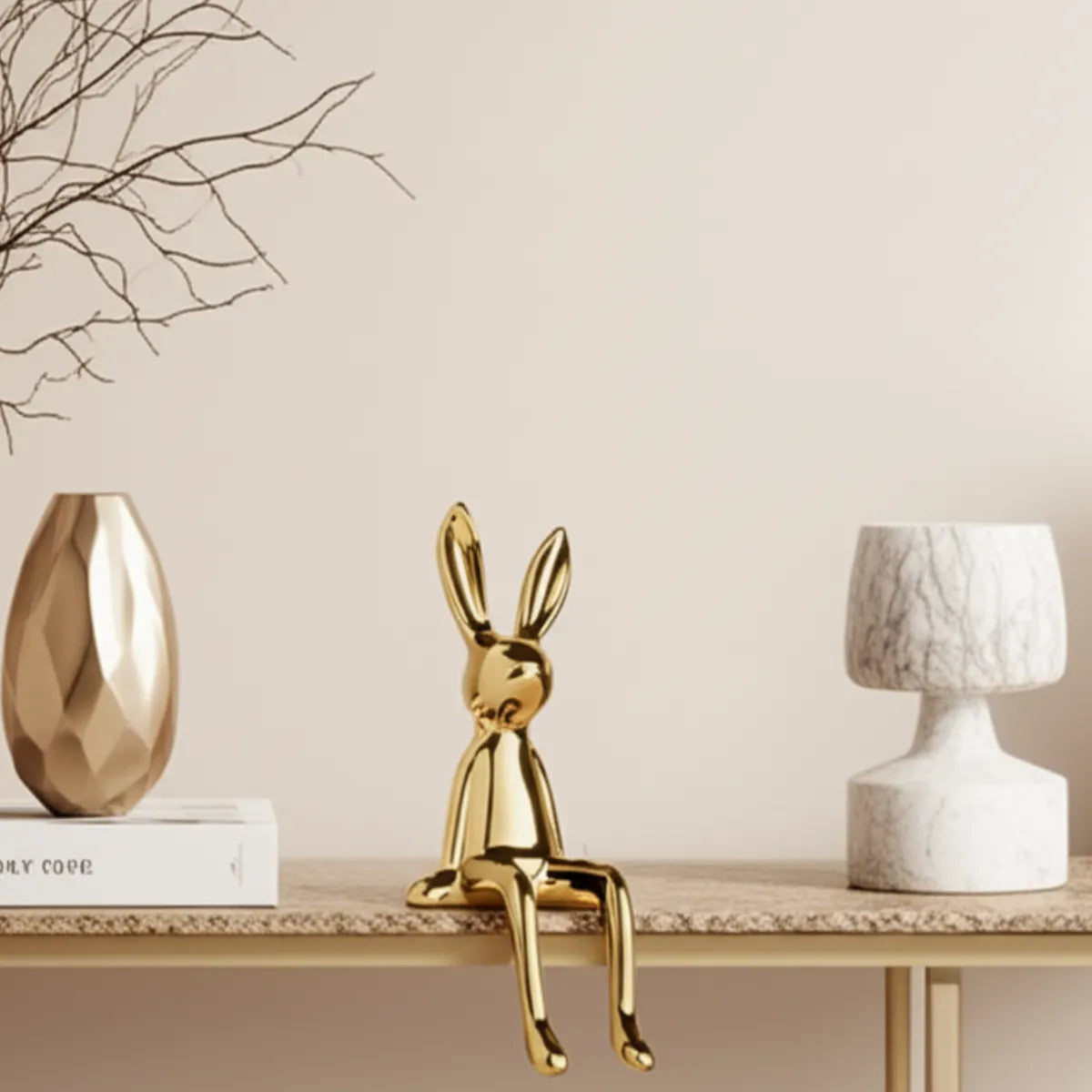 escultura-decorativa-coelho-dourado-modernize-foto-frontal-escultura-de-coelho-em-mesa-com-esculturas