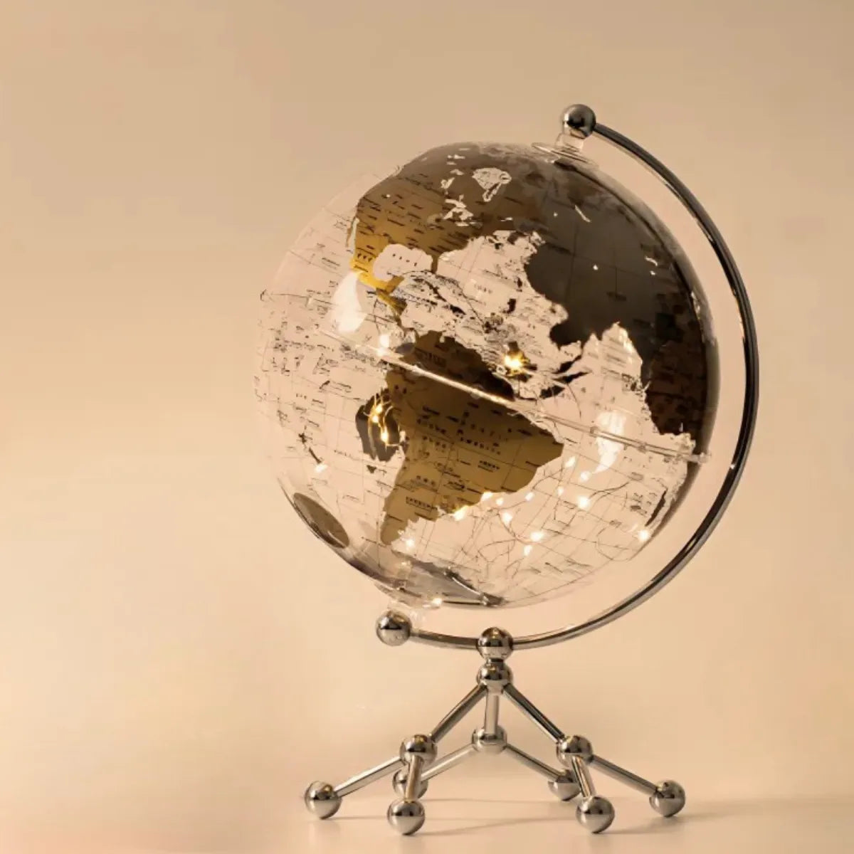escultura-decorativa-globo-terrestre-iluminado-dourado-modernize-foto-frente-globo-sobre-a-mesa-ambiente-arejado