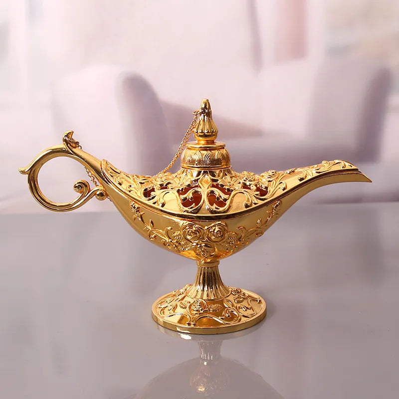 escultura-decorativa-lampada-legend-aladdin-dourado-modernize-foto-lateral-escultura-sobre-mesa-ambiente-claro
