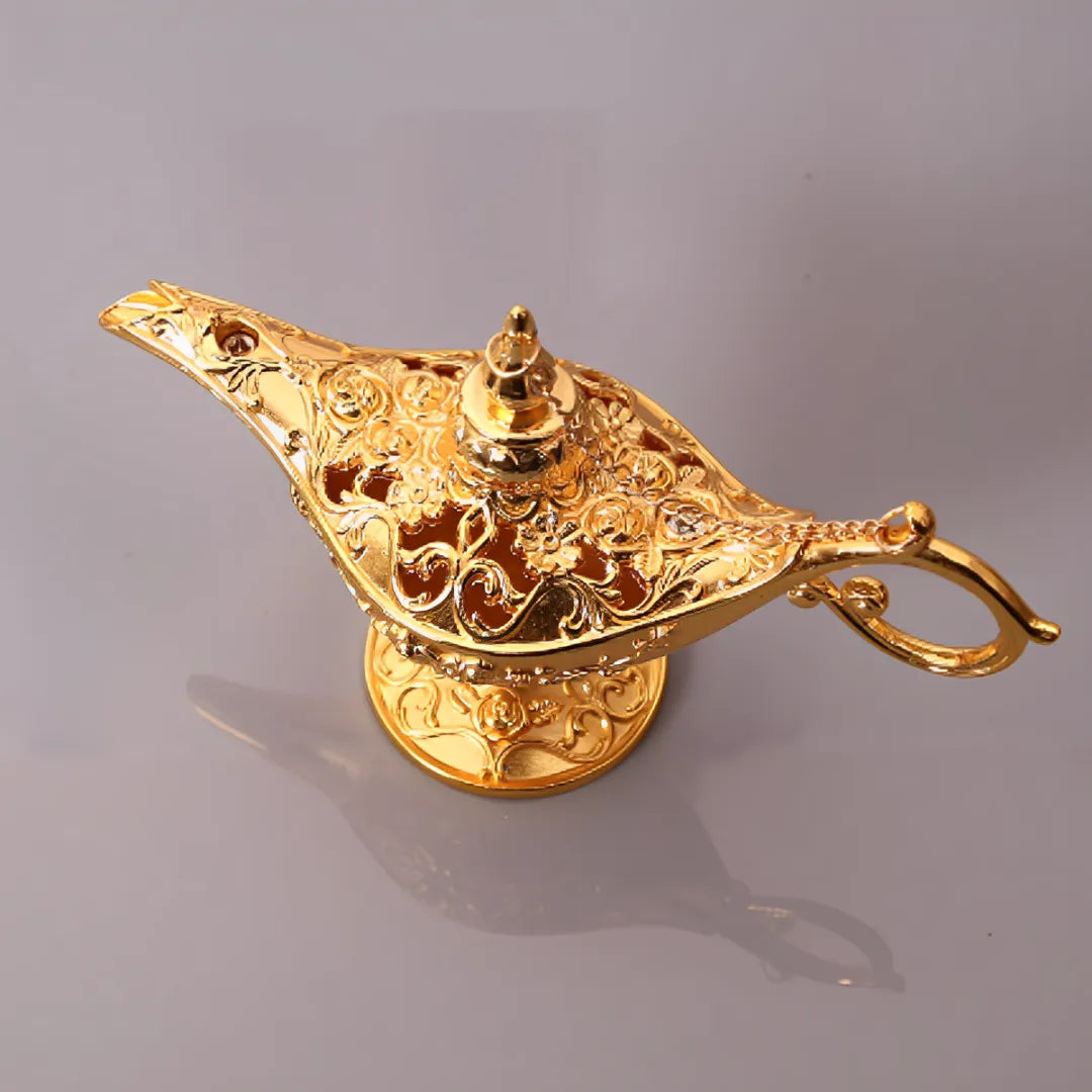 escultura-decorativa-lampada-legend-aladdin-dourado-modernize-foto-aerea-escultura-sobre-mesa-ambiente-claro